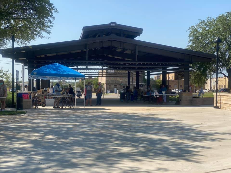 The pavilion at Heritage Square Park on a market morning